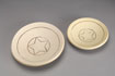 Circular stoneware platters 17 cm diameter [CP 2-1] cream matt glaze ($55); [CP 1-1] pale yellow matt glaze. $45 